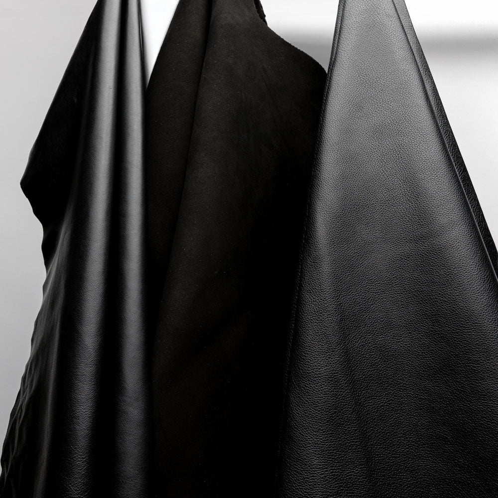 A full suede skin, distinguished by its gentle nap, a texture that is smooth yet subtly fibrous.
