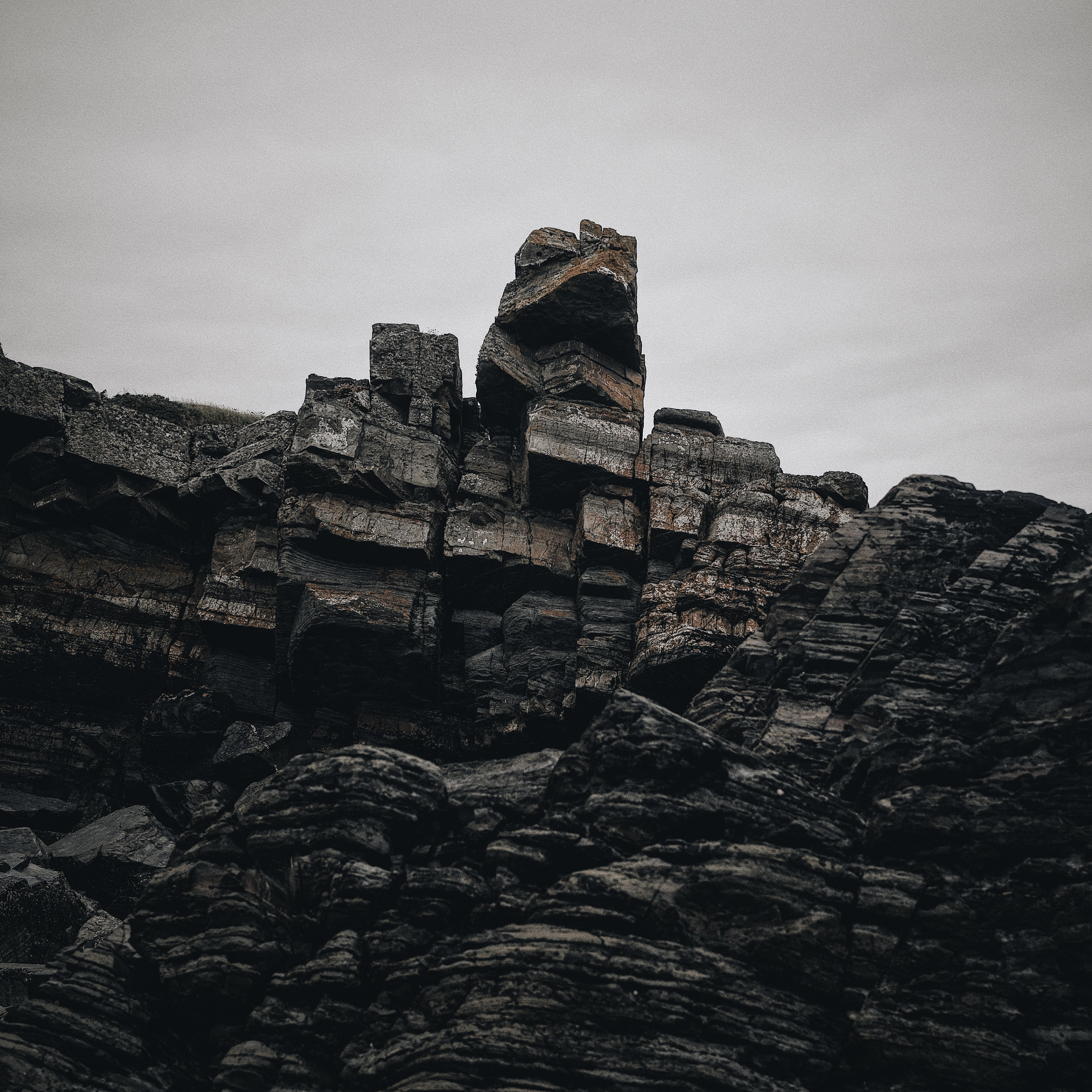 A WEATHERED ROCK ON THE BRITISH COASTLINE. THE 1812 ODYSSEY COLLECTION, HANDMADE IN ENGLAND.